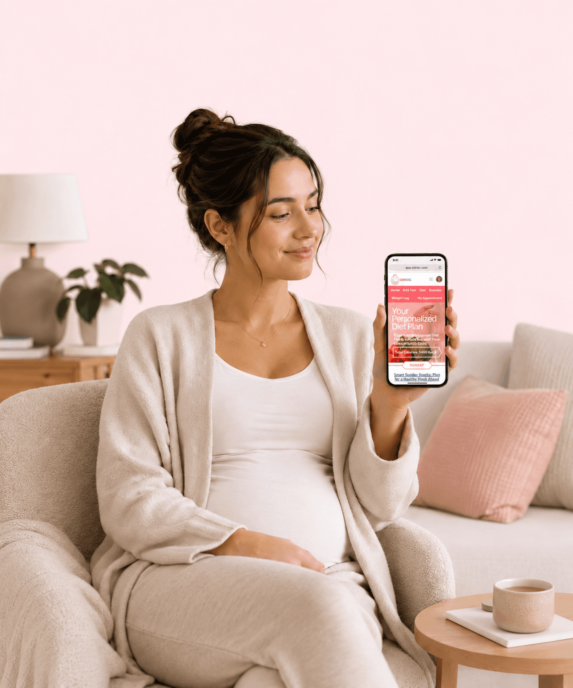 A pregnant woman showing the ODRISC app on her smartphone